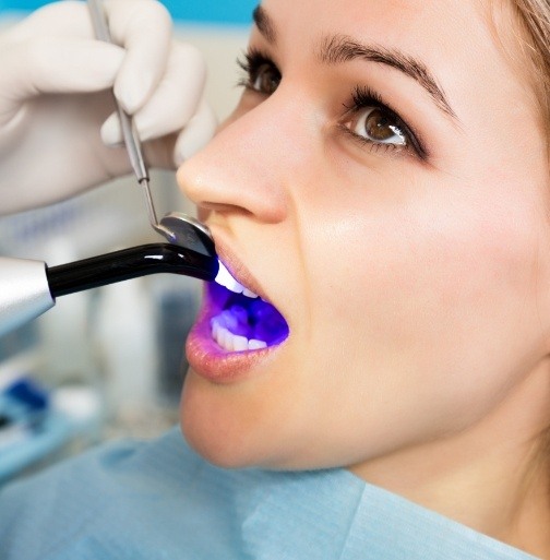 Patient receiving dental bonding treatment