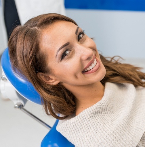 Smiling woman in dental chair