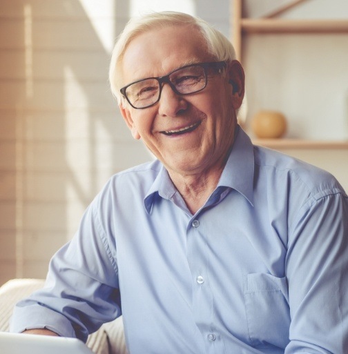 Smiling man with dentures