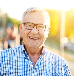 Man smiling with dental implants in Newington