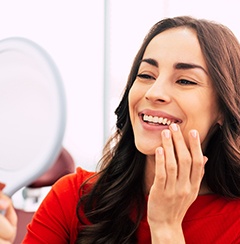 woman smiling with dental implant