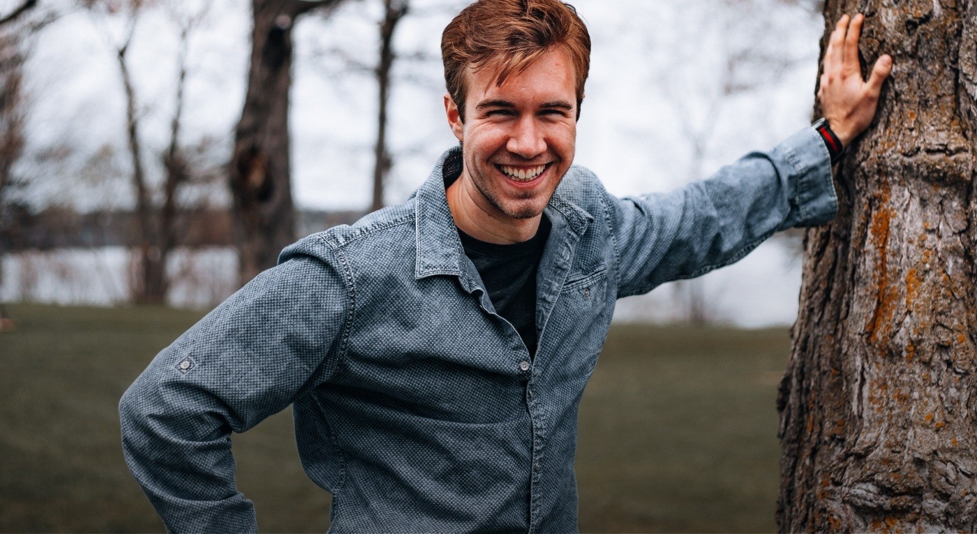 Man with healthy smile after emergency dentistry