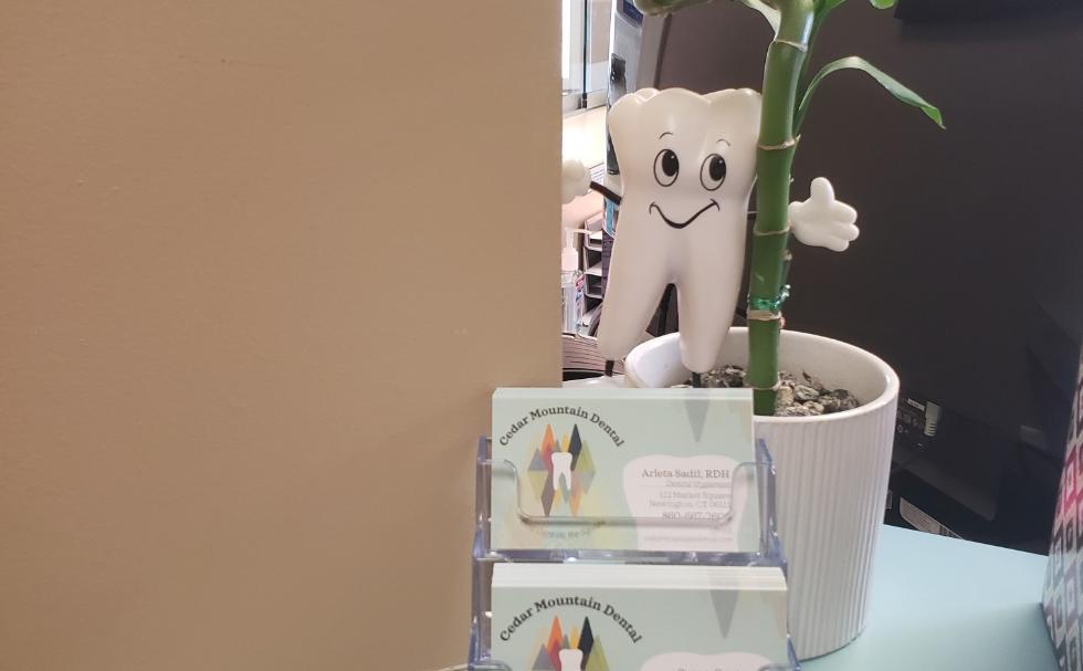 Dentist business cards on reception desk