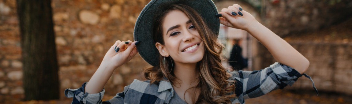 Woman sharing bright smile after teeth whitening