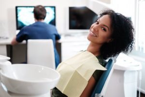 Woman smiling in dental chair