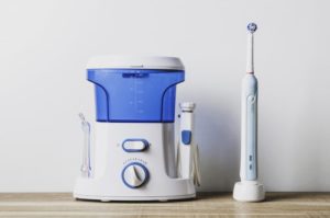 Electric toothbrush and waterpik